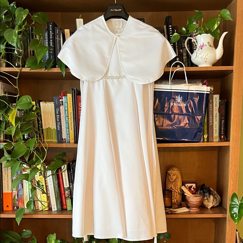 First Communion dress, cape, shoe, and veil set.